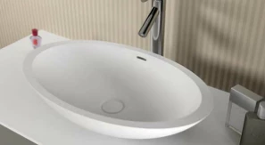 Riho Avella opbouwwastafel ovaal mat wit B58xD36xH14cm met waste F7AN6058361110
